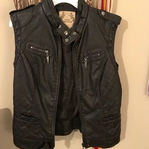 Dark brown leather vest